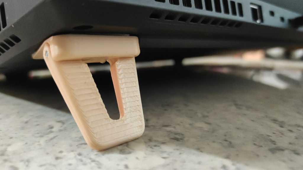 Stick-on Minimalistic foldable Laptop feet.