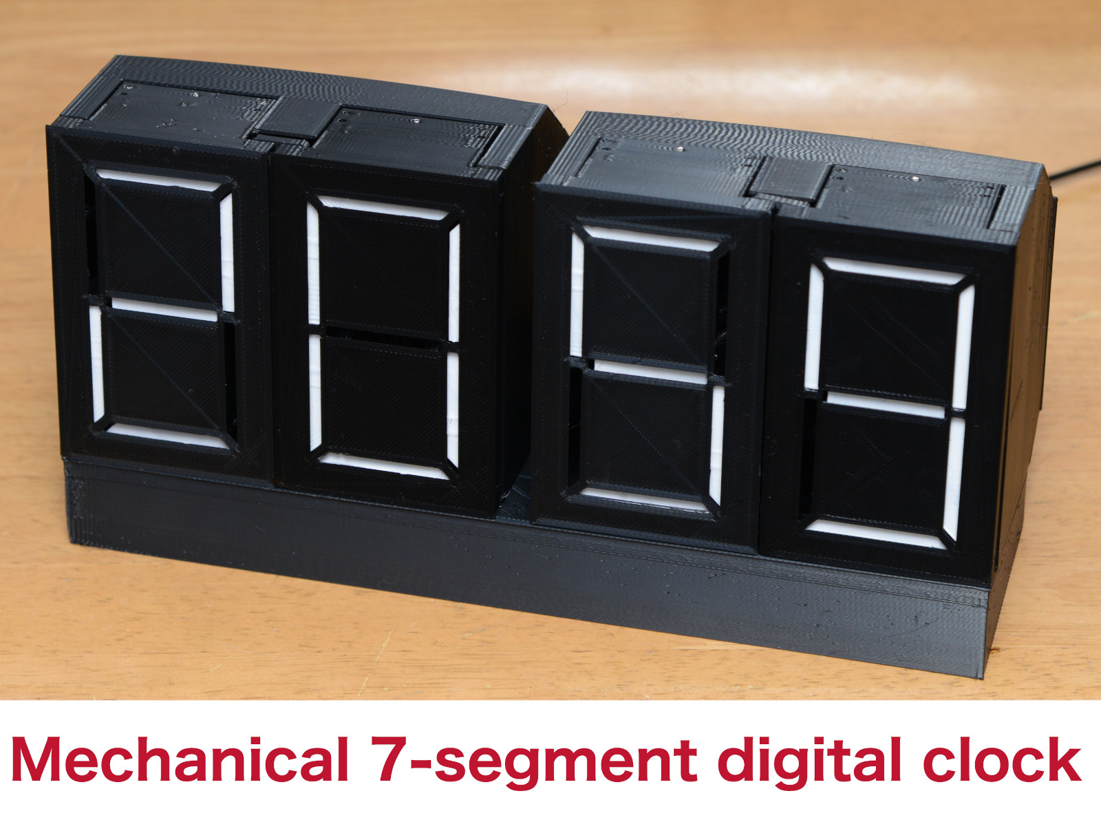 Digital clock with mechanical 7-segment display units