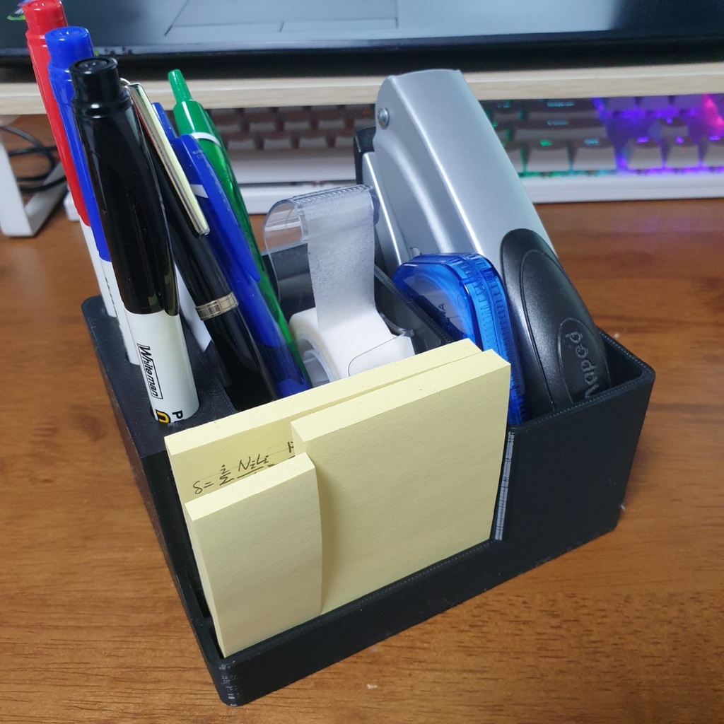 desk organizer - pen , post-it , stapler , etc.