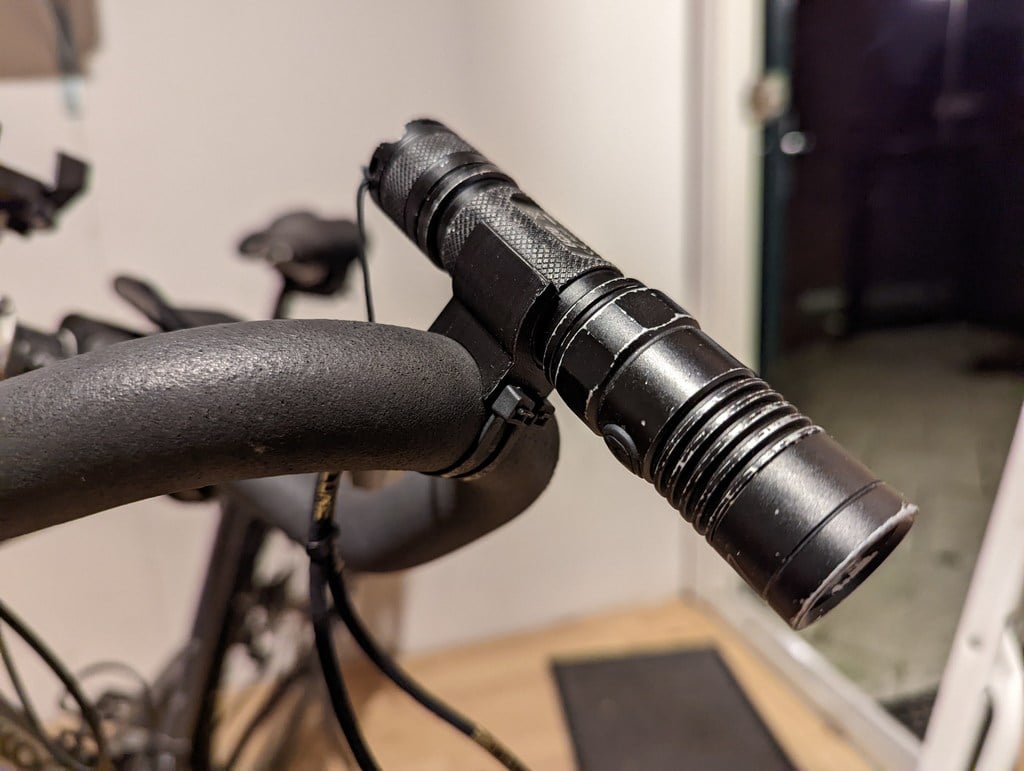 Bike light torch holder (customizable with OpenSCAD)