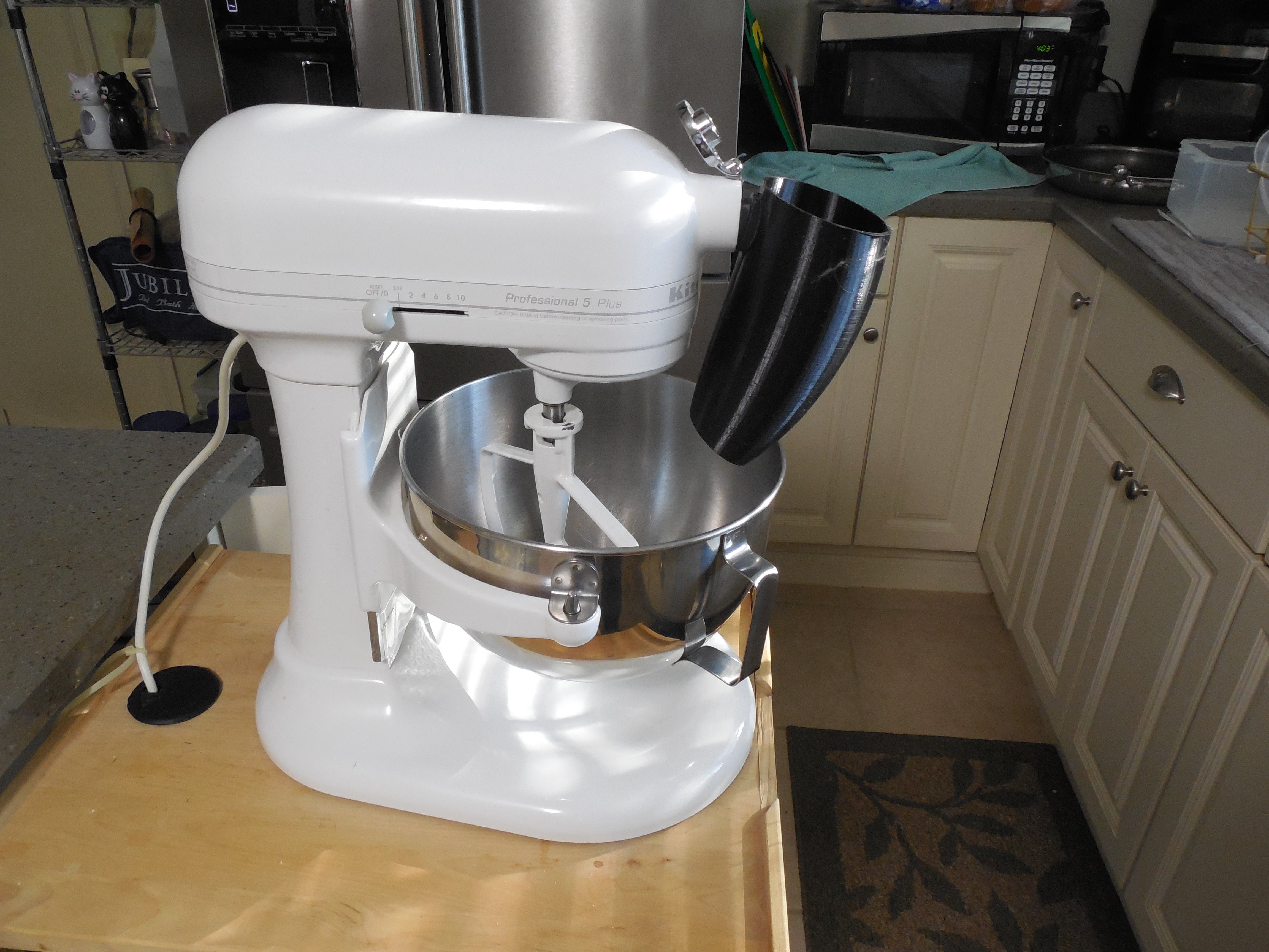 Funnel attachment for a Kitchen Aid stand mixer