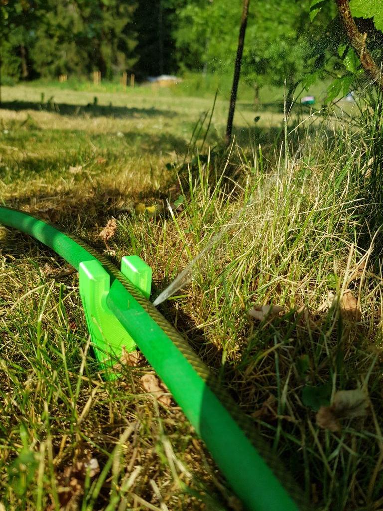 Precision irrigation hose ground support