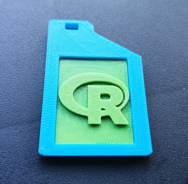 keychain with the R programming language logo