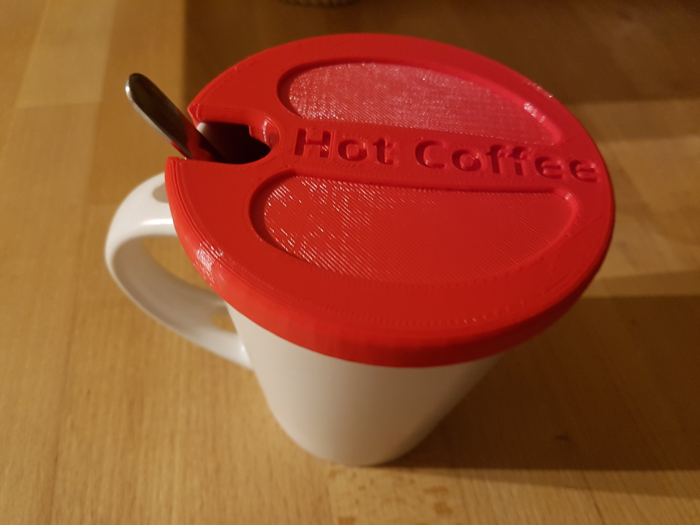 HotCoffee Mug Cap to keep your drink warm.
