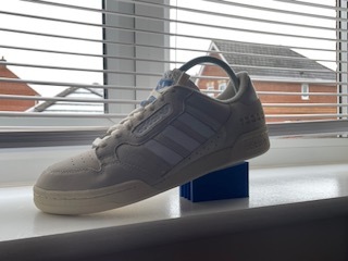 Adidas themed trainer stand