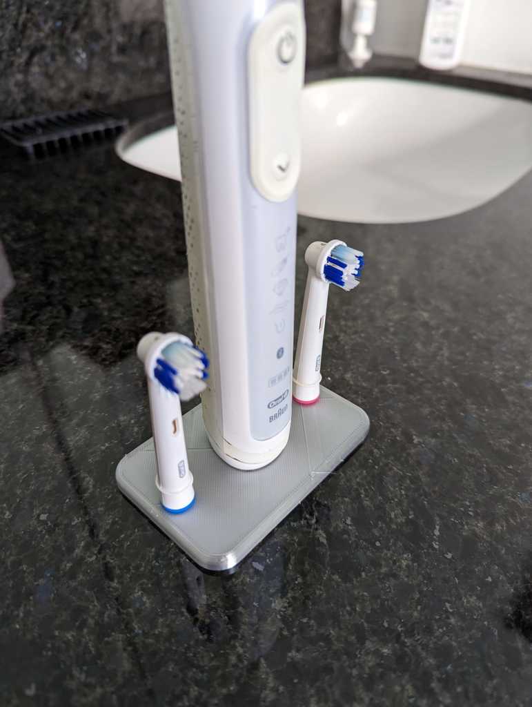 Oral B Electric Toothbrush and Brush Head Stand