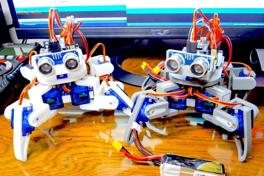 Arduino controlled 2-joint 8-servo 4-legged Walking Robot by 