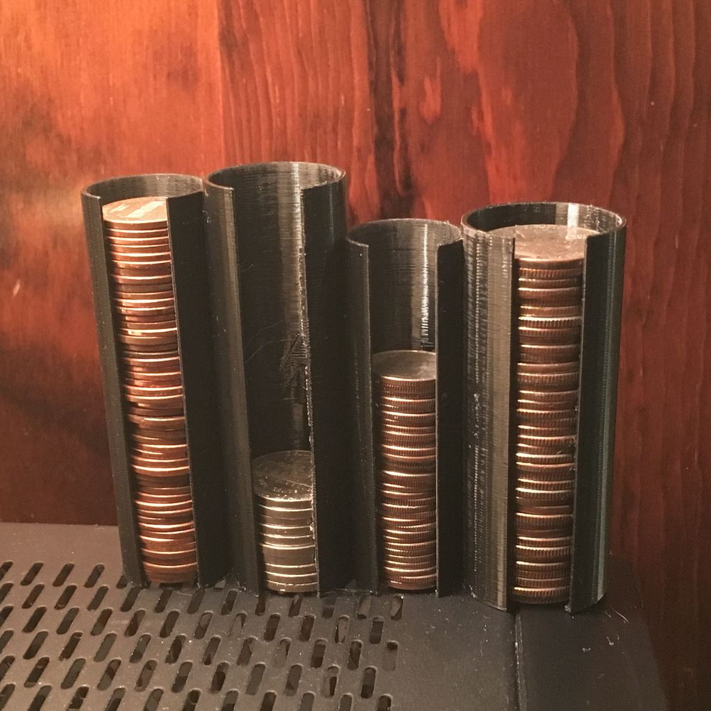 Coin holder for paper sleeve rolls