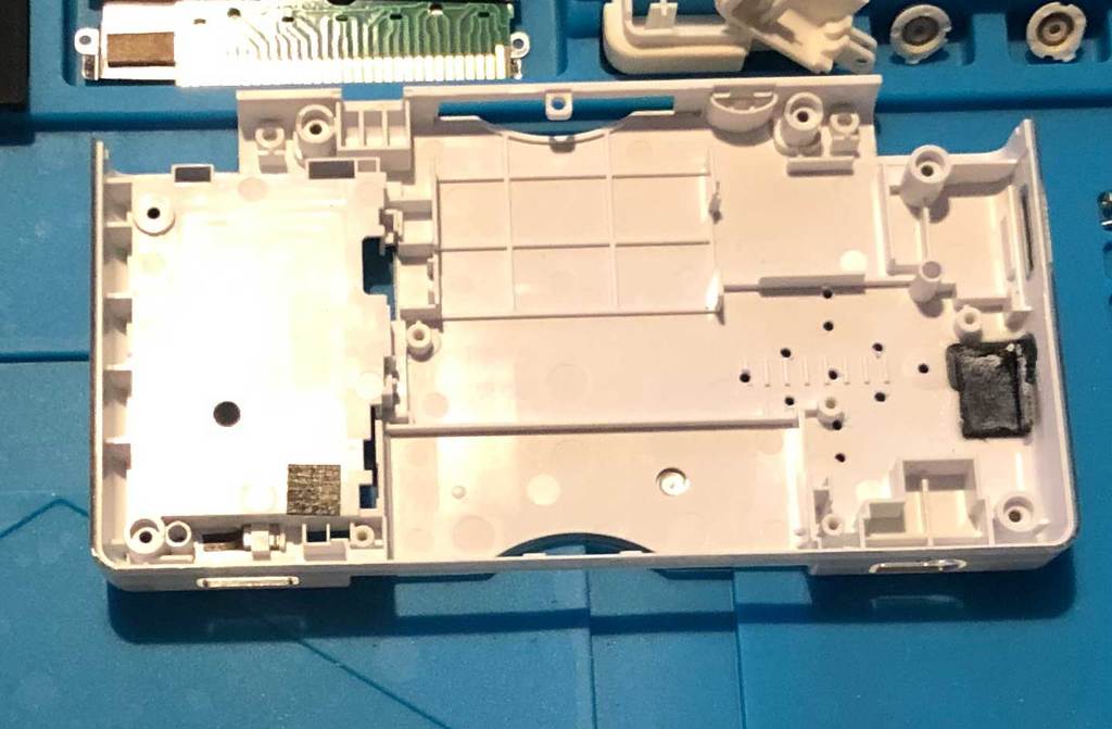 Nintendo DS Lite stylus hole cache