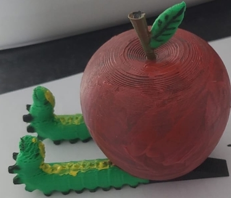 Apple with worms phone holder