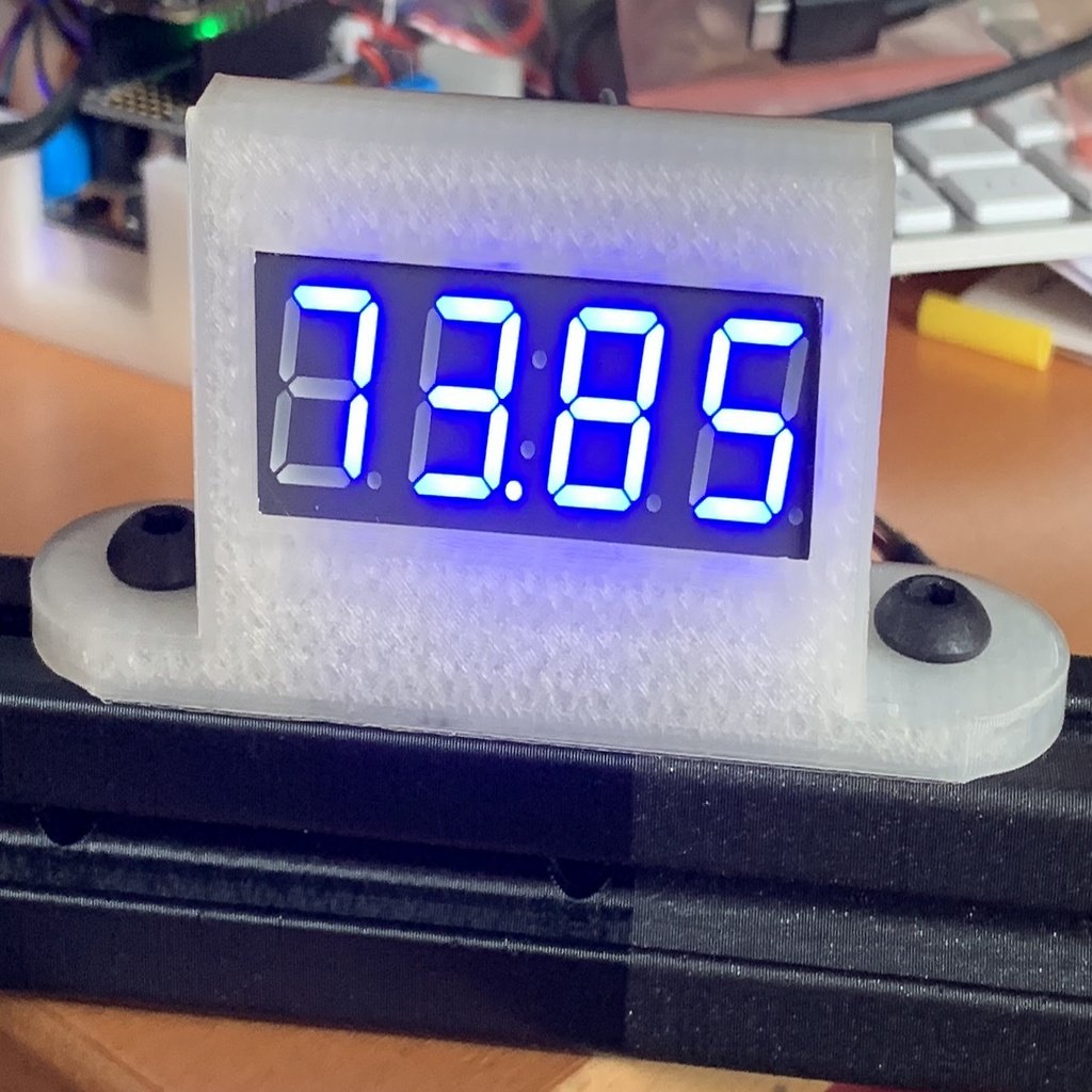 A four digit, seven segment led display holder for an 8020 series 10 extrusion 