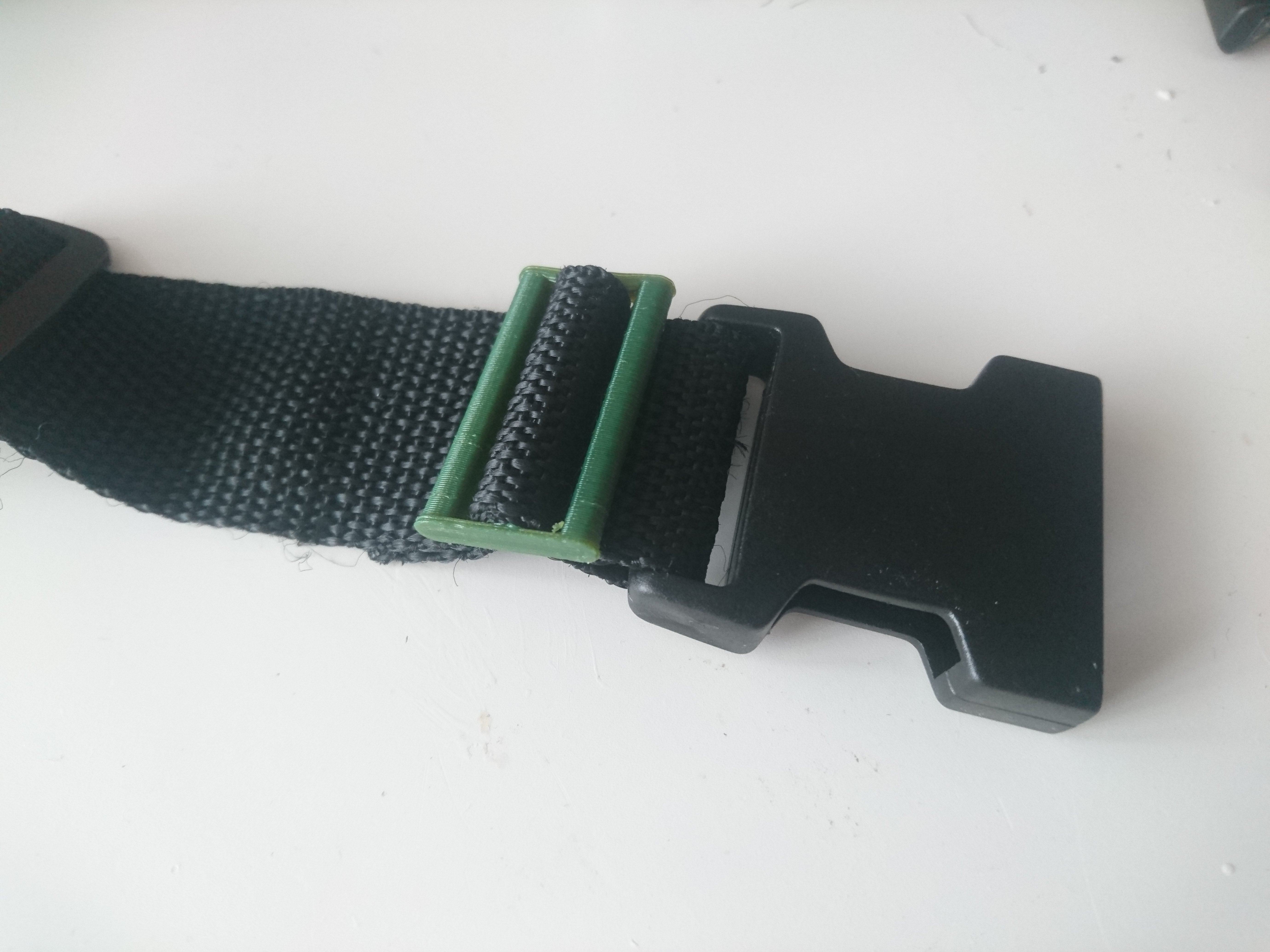 Strap adjuster / stop buckle for 32mm strap