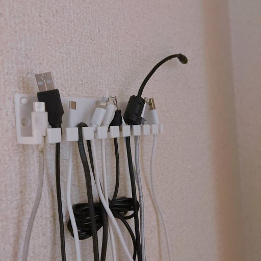 USB cord hook using map pin