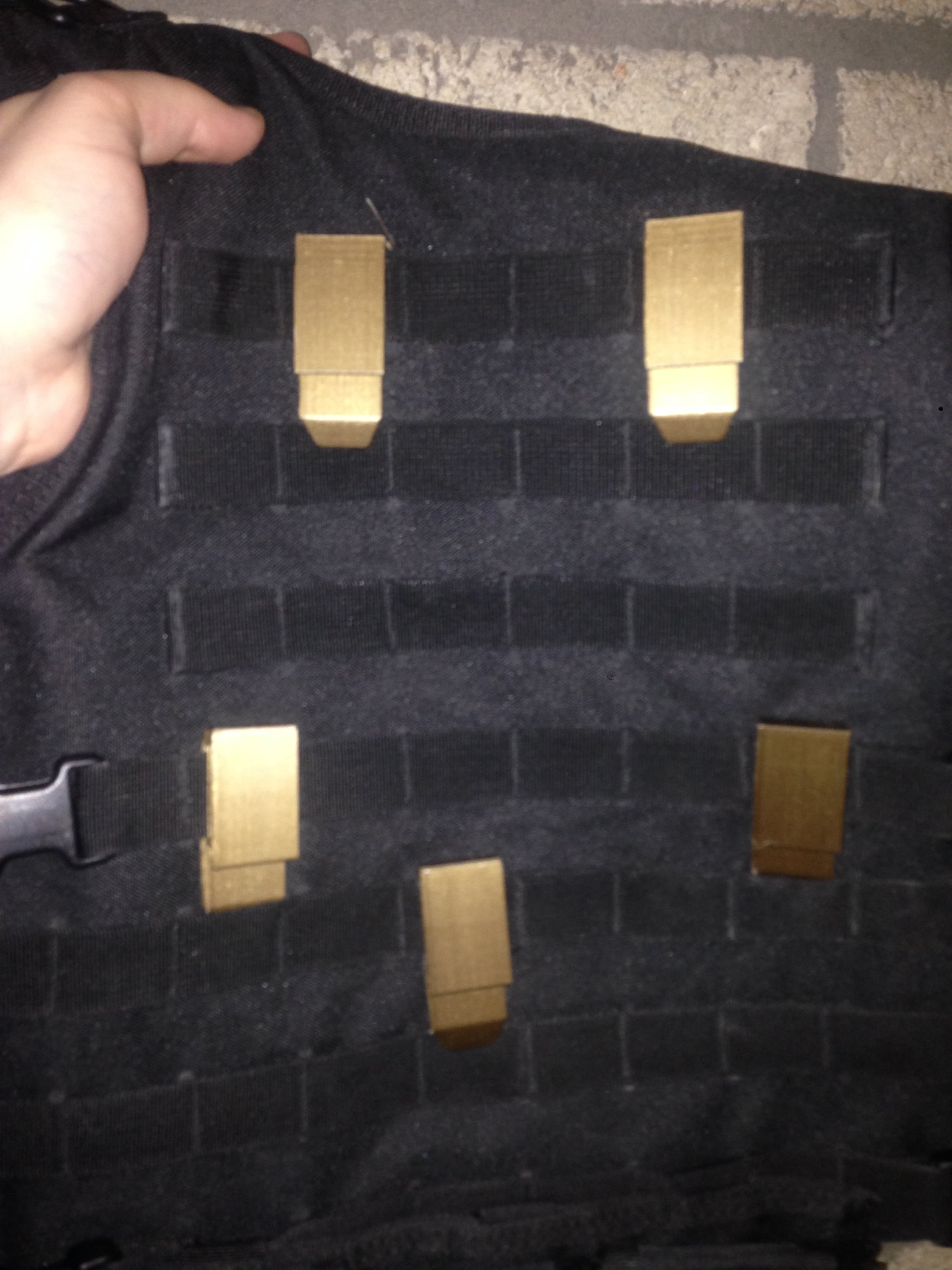 locking MOLLE system clip and MOLLE clip