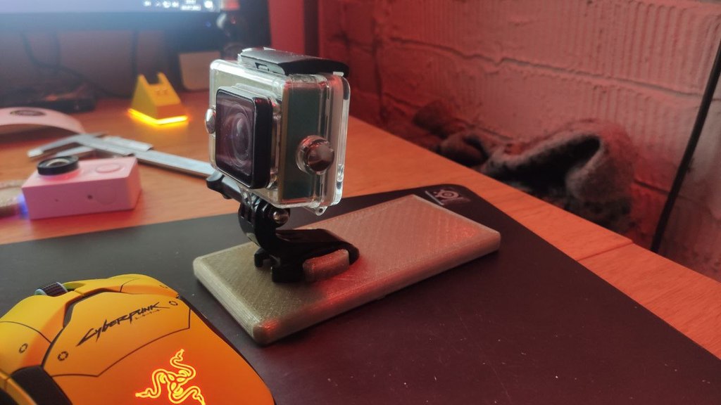 Action camera mount adapter to smartphone holder