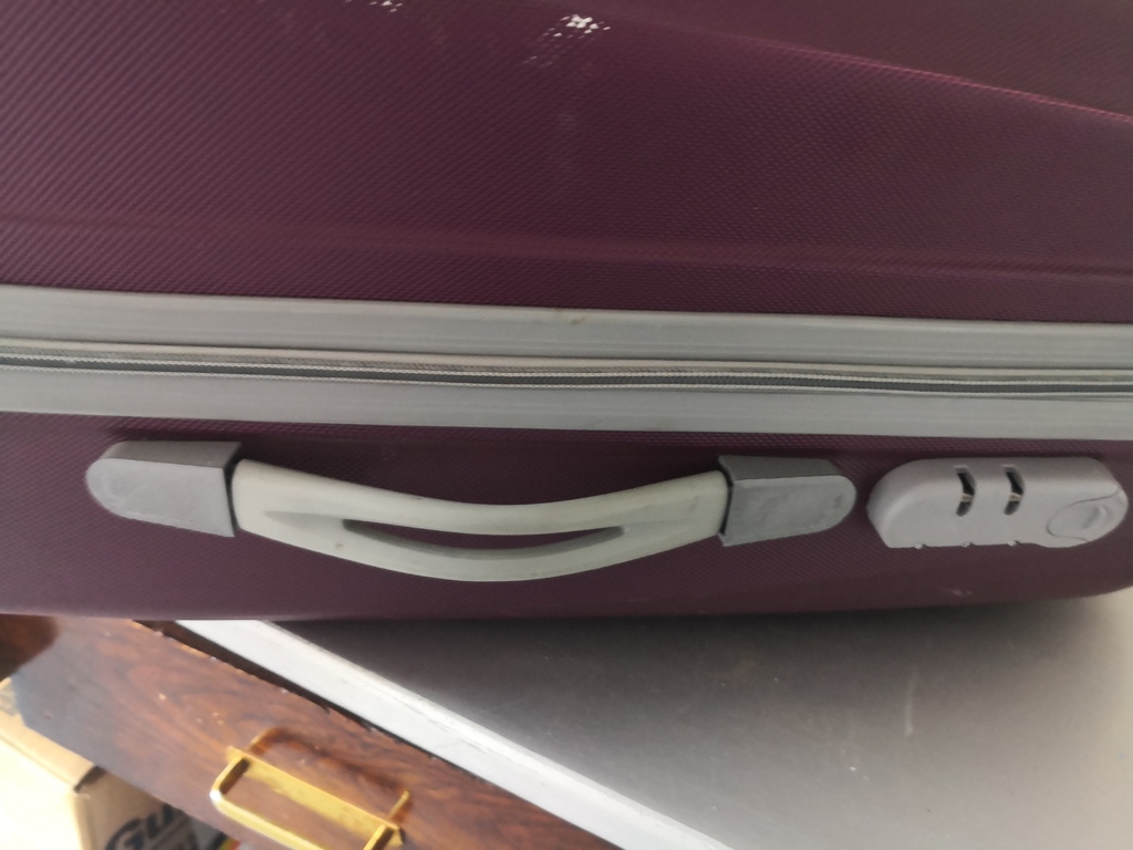 suitcase handle support