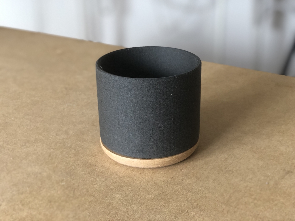 Minimalist integrated coaster cup