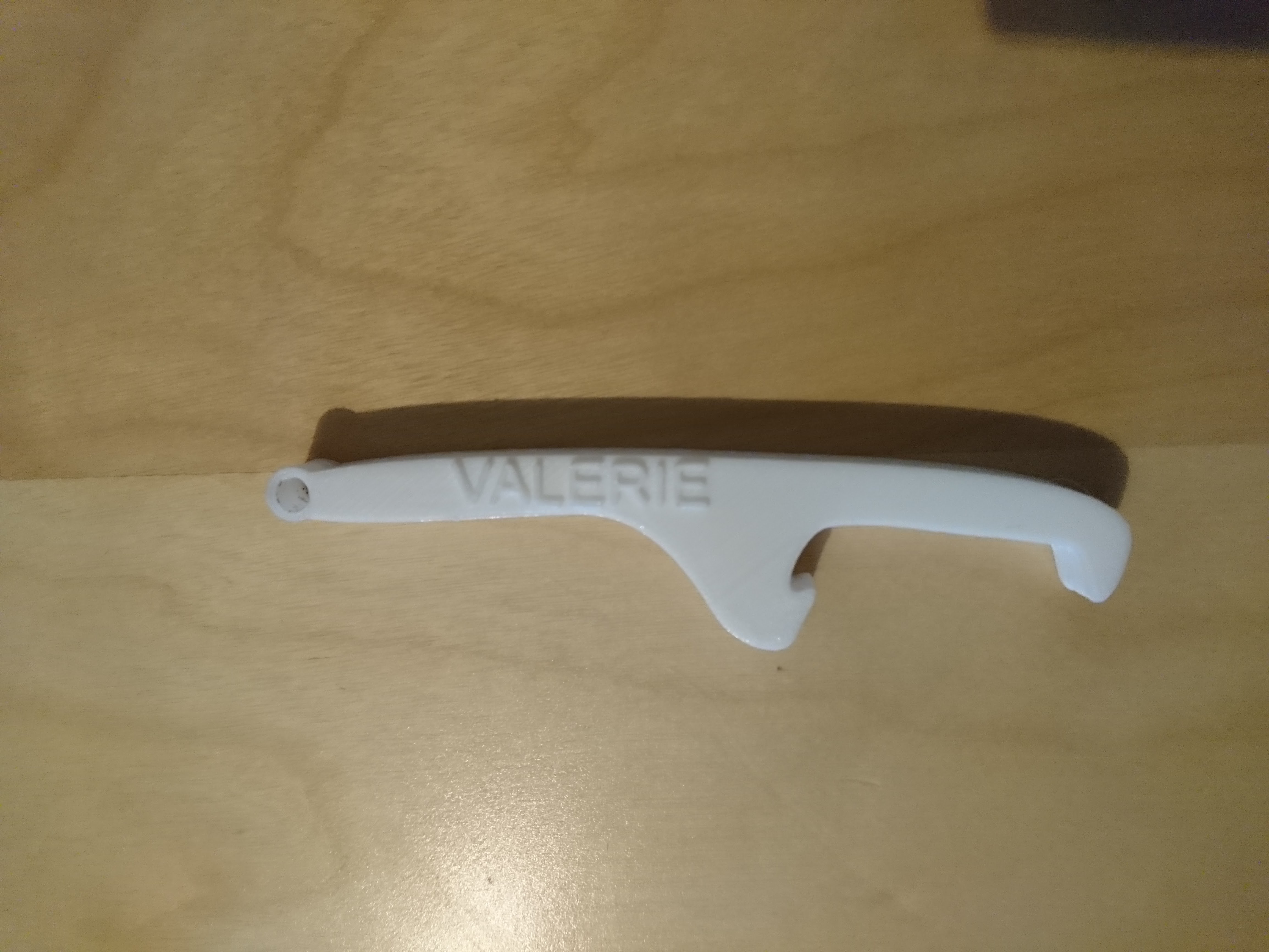 Bottle opener (with text + hole)