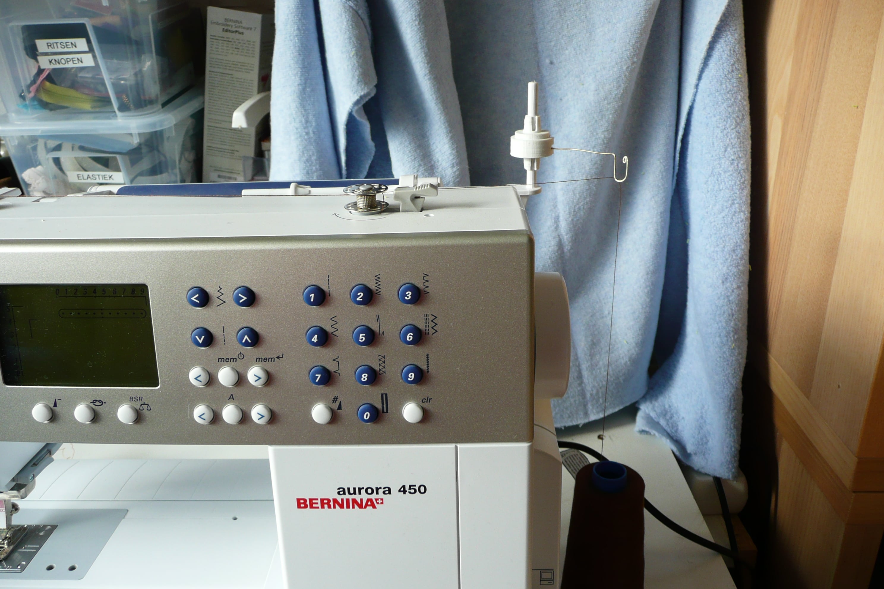 Large spool to small spool sewing machine solution