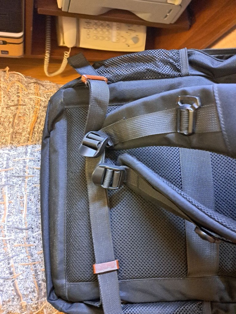 Back Pack holder and tape clip