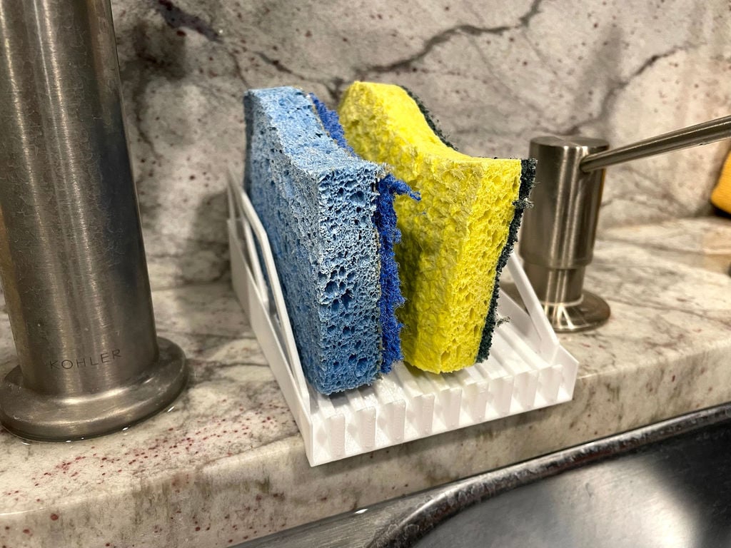 Vertical triple sponge holder for kitchen sink