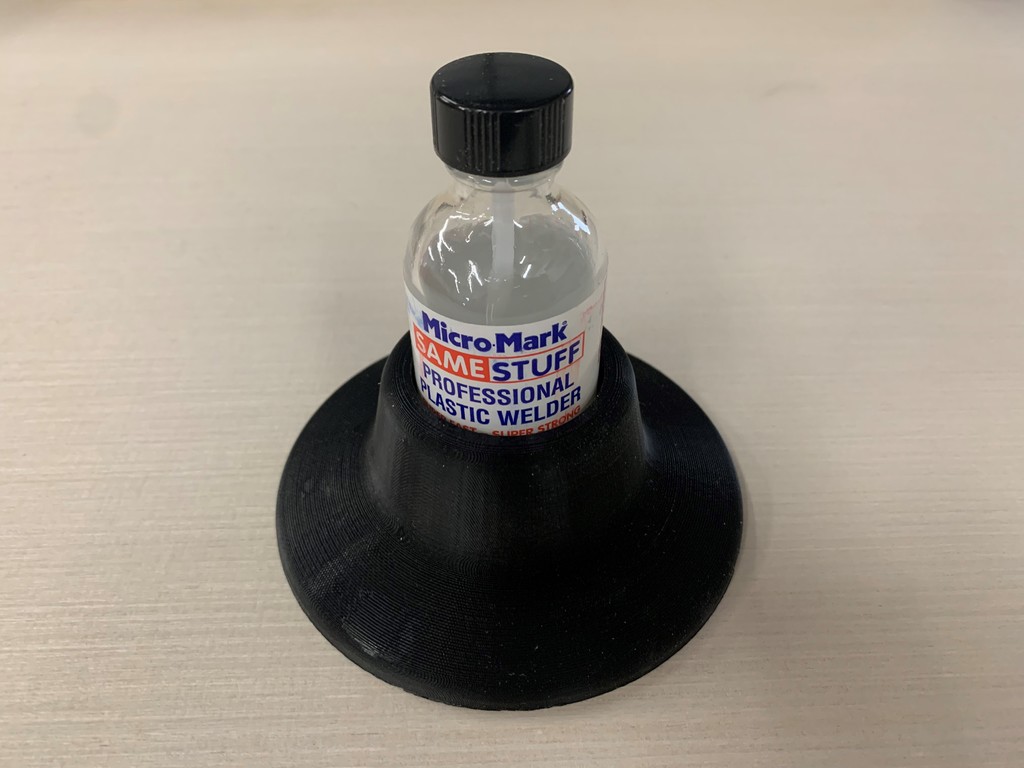 no spill base for plastic weld bottle