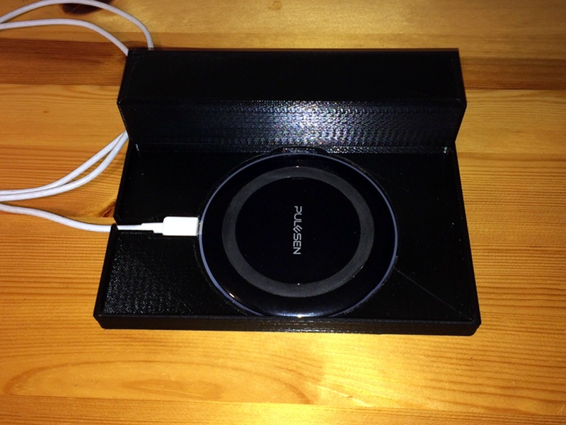 bedside phoneholder with integrated wireless Qi charger