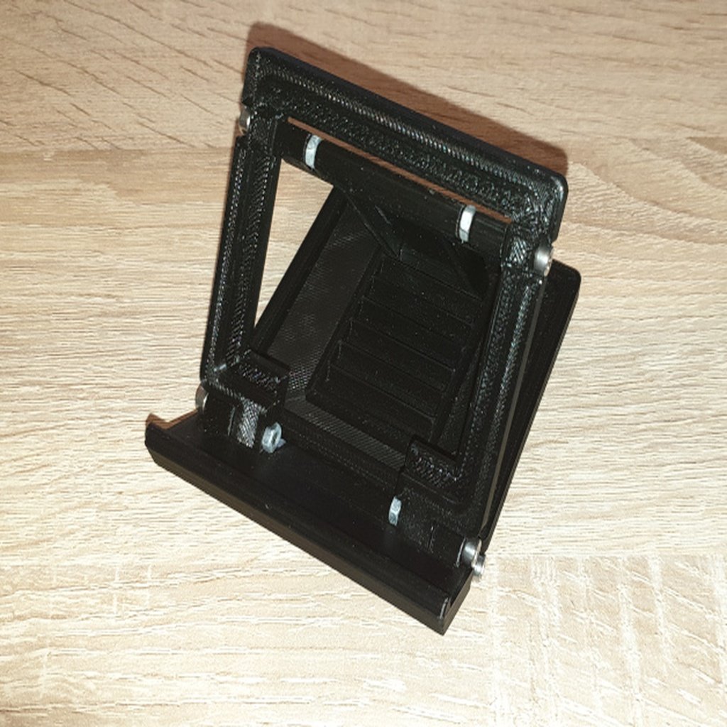 Compact, foldable phone stand