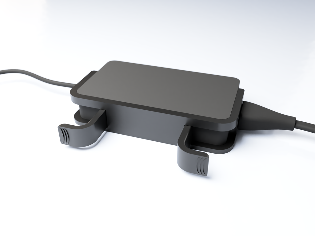 Apple Mac style cable collector for surface charger