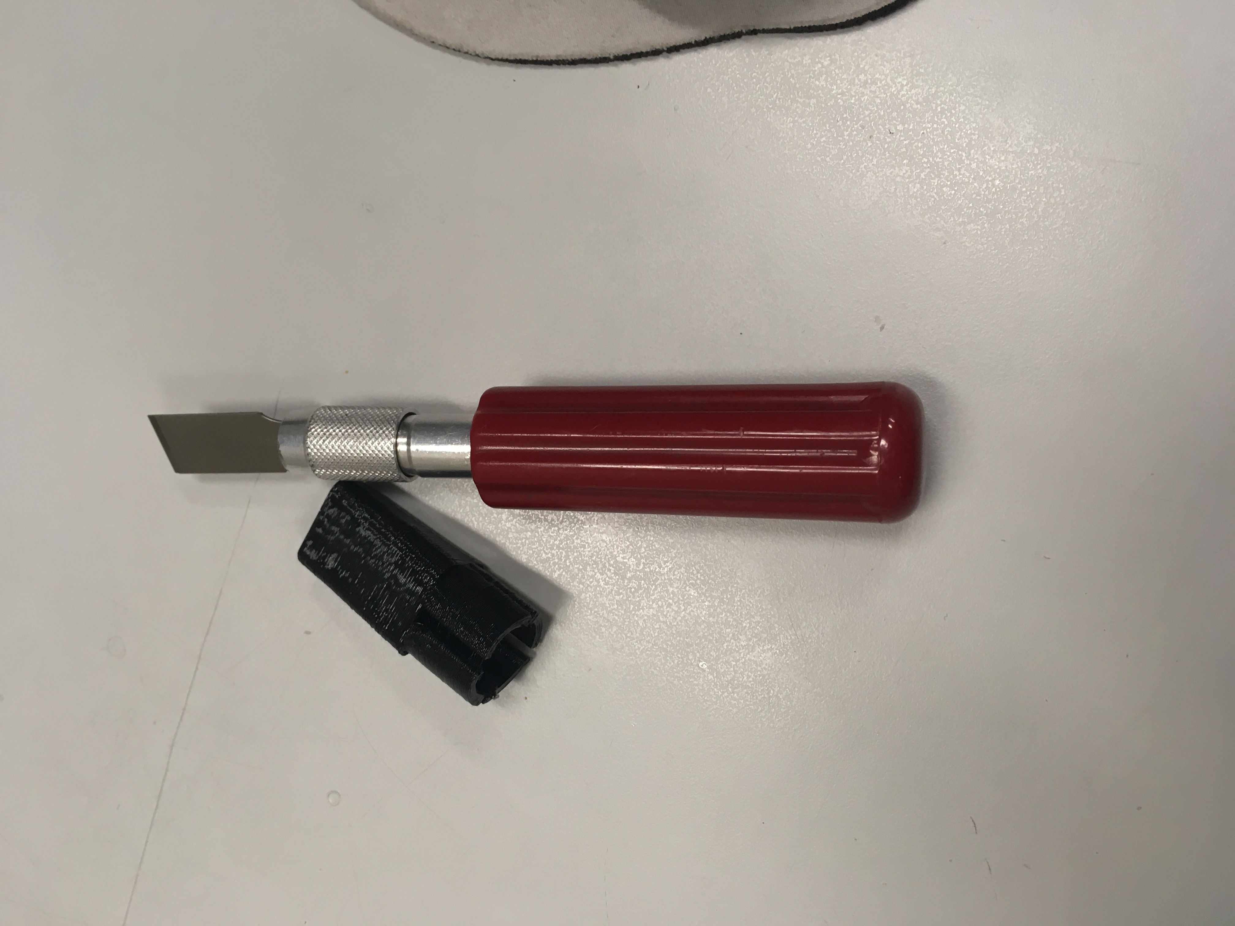 X-acto blade cover red handle