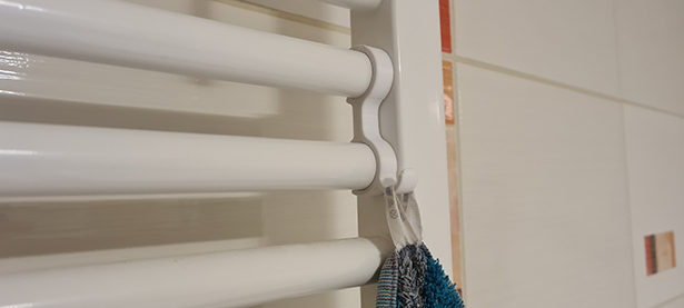 Hanger for towel radiator