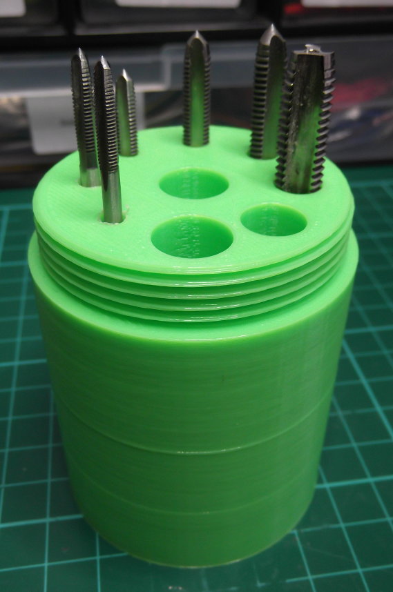 Threaded tap holder