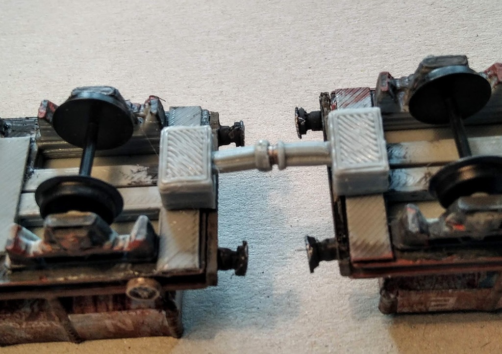 Couplings for HO and OO scale model railways