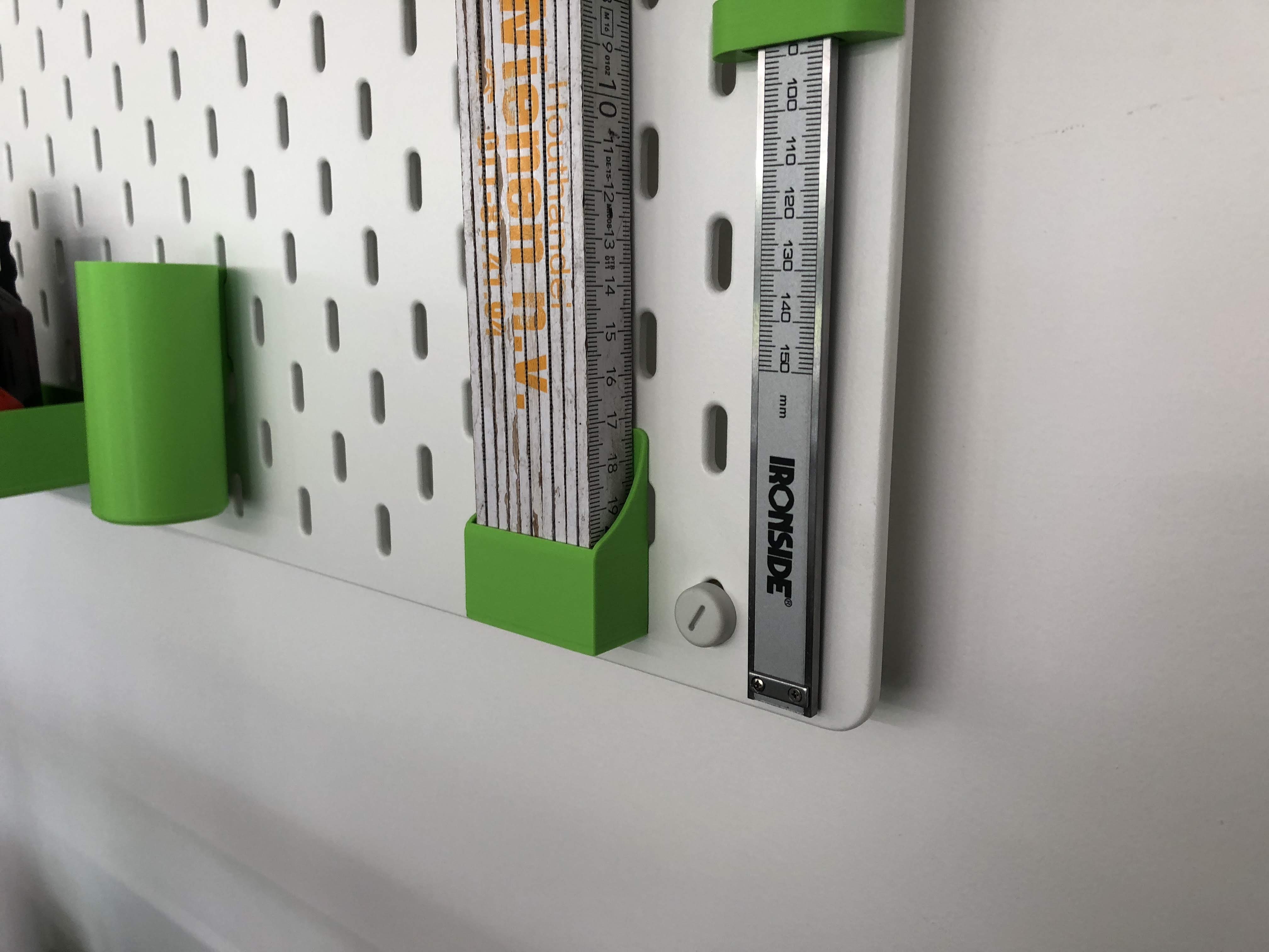 Skadis folding meter holder