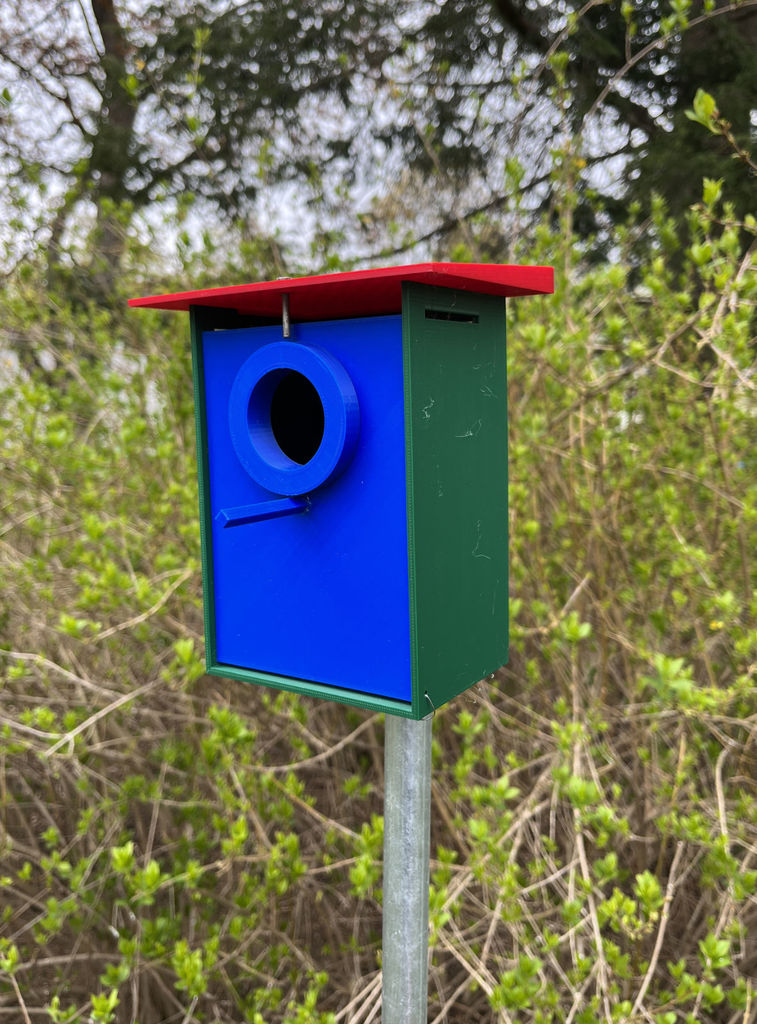 Birdhouse with perch