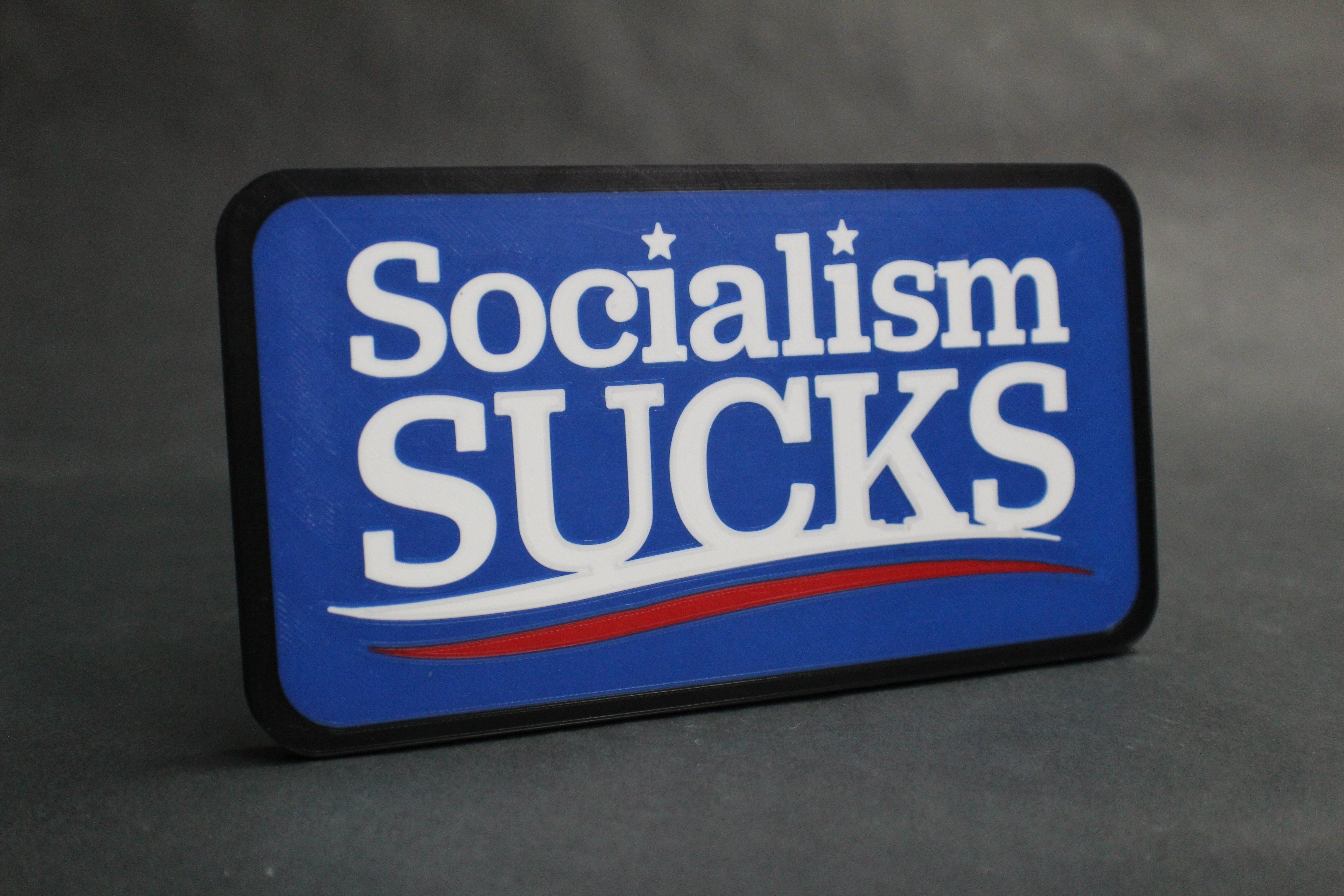 Socialism Sucks 2" Multicolor Trailer Hitch Receiver Plug Cover