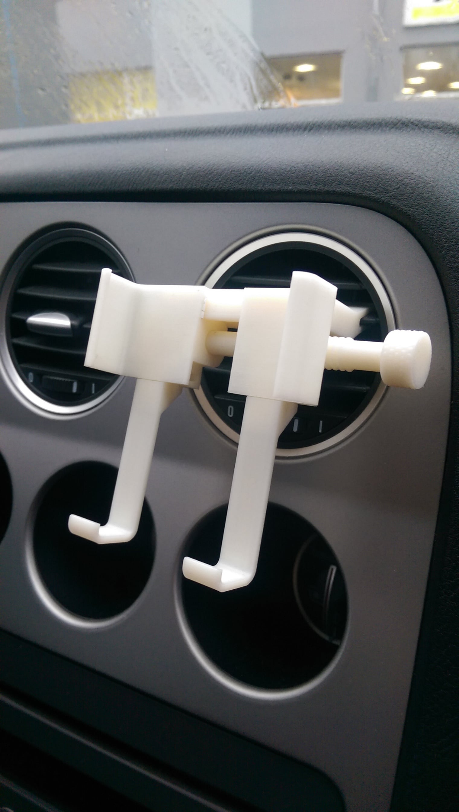 Adjustable car phone holder