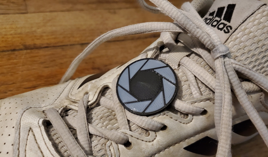 Aperture Science Shoelace Badge