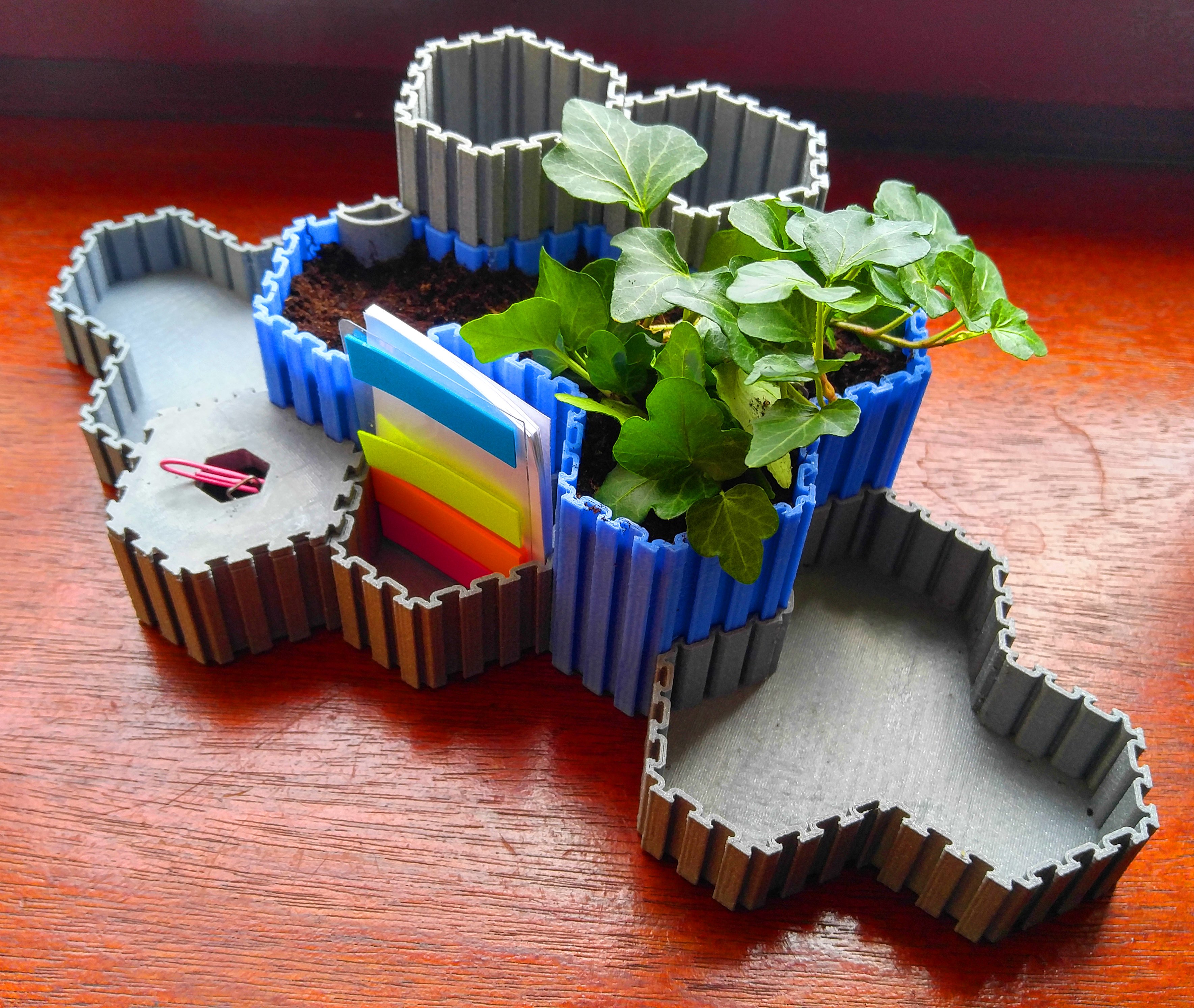 HOPPIS: Hex-organizer-plant-pot-interlocking-system