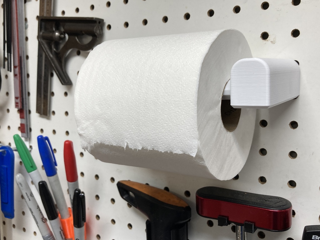 Toilet paper roll holder for pegboard