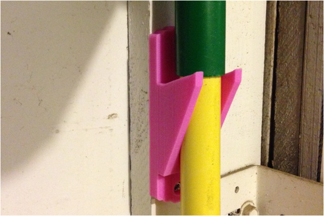 Art Deco (sort of...) broom wall hook