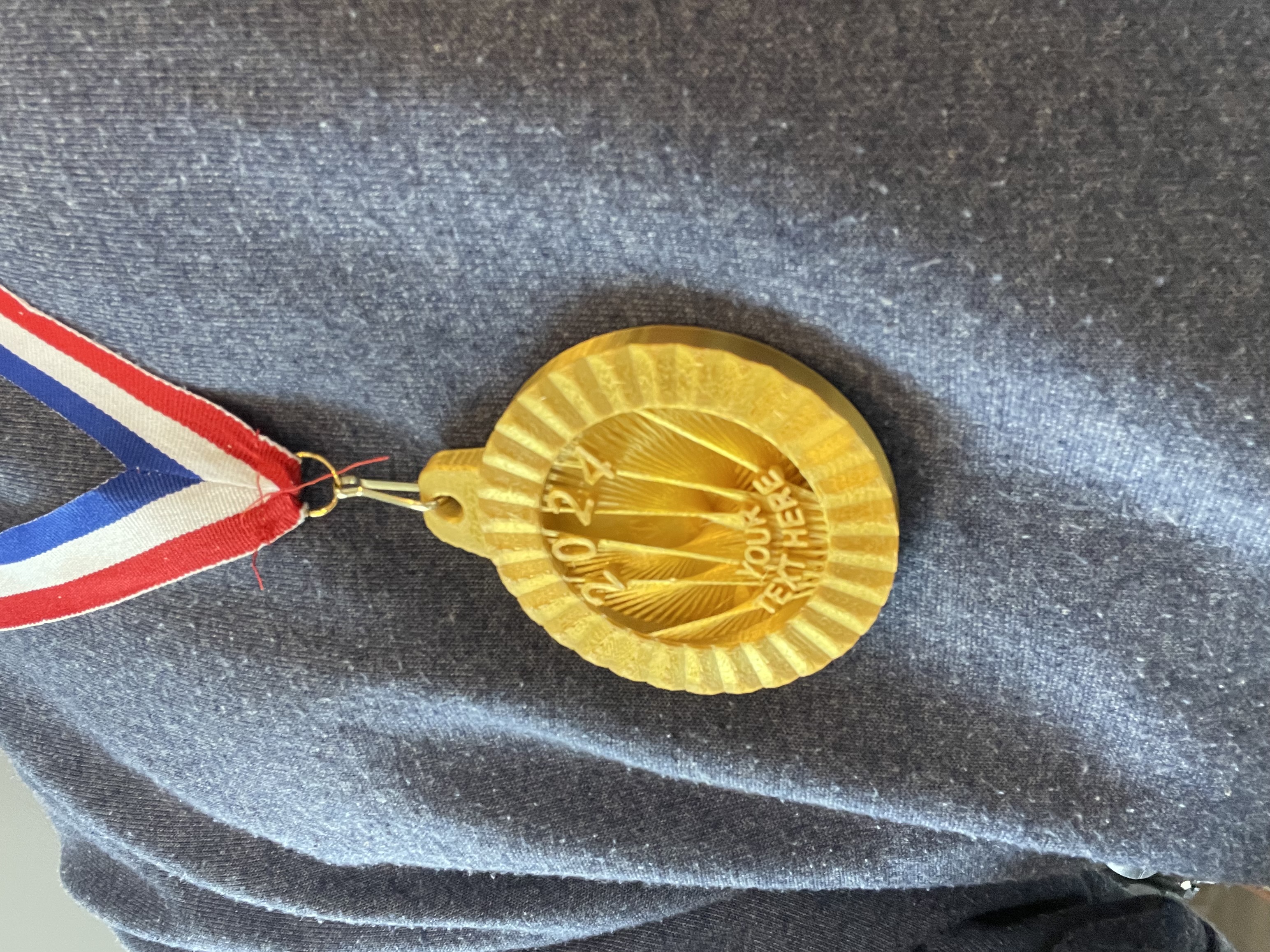 Custom medal from string ornaments