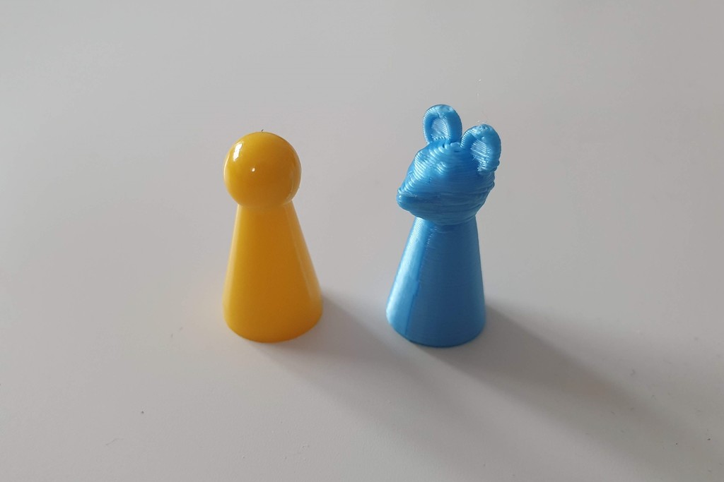 Mouse-shaped playing piece