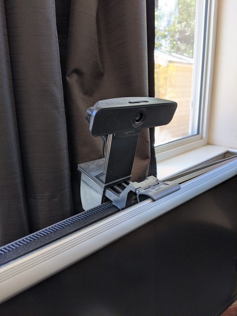 Webcam mount for monitor light bar