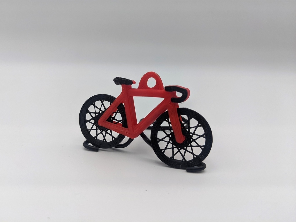 Spinning Wheel Bike Keychain
