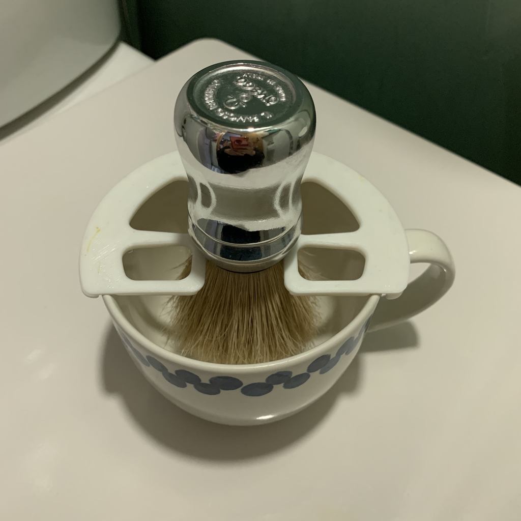 Shave brush holder on mug