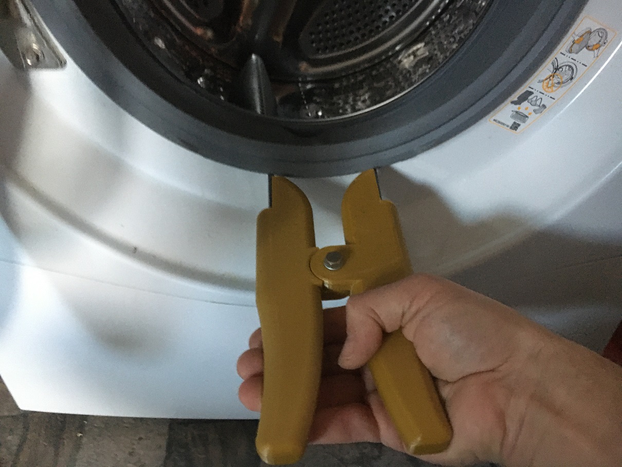 Washing machine outer tub spring expansion tool