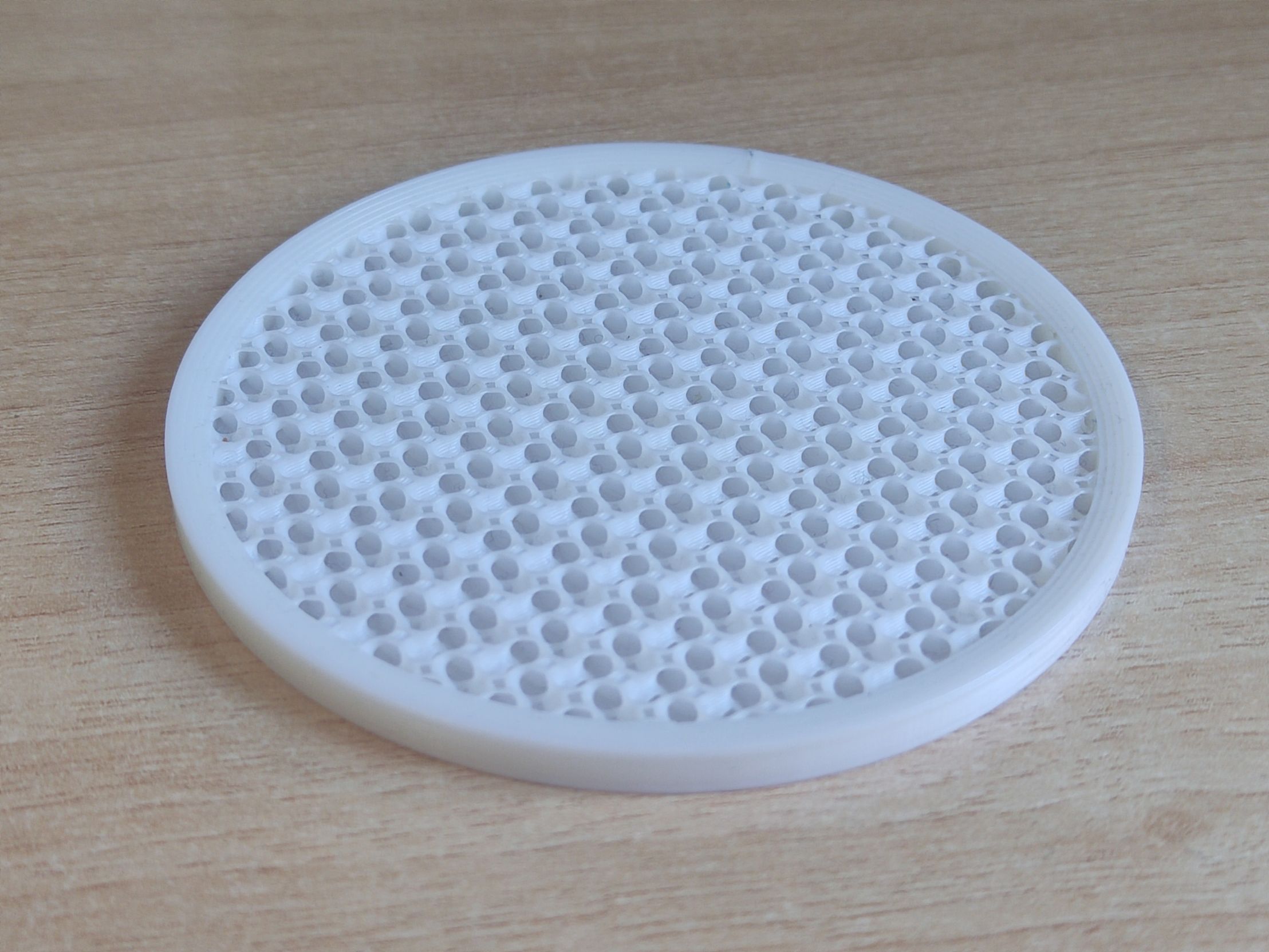 Coaster for exposed infill configuration