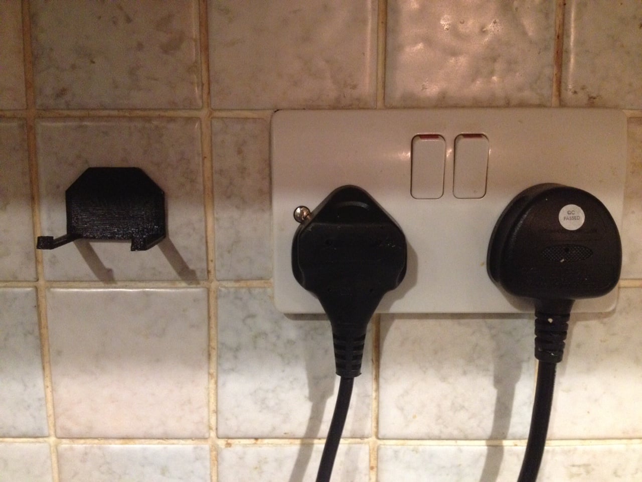 UK Plug Holder