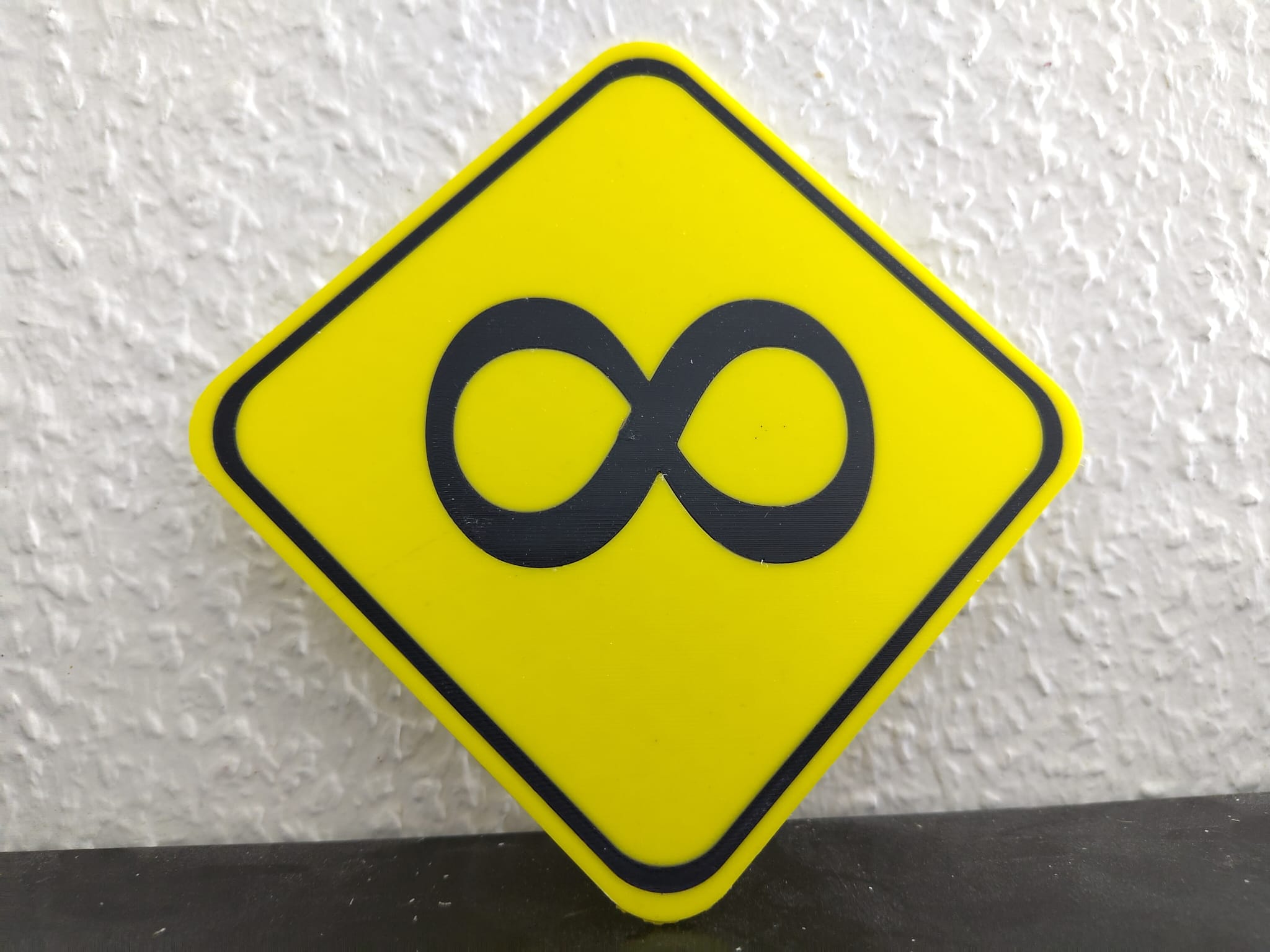 Infinity warning sign two color
